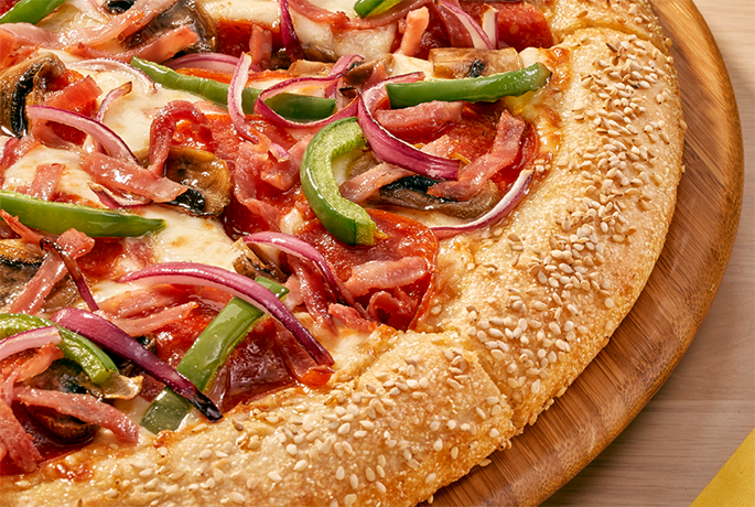 Howie special pizza with various toppings