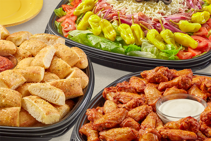 Parry Platters of Howie Bread, wings, and salad